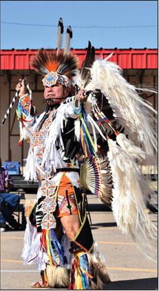 Dwight Whitebuffalo completes a Fancy Dance at Geary's Native 66 Festival on Oct 22, 2022. He is Cheyenne-Lakota.