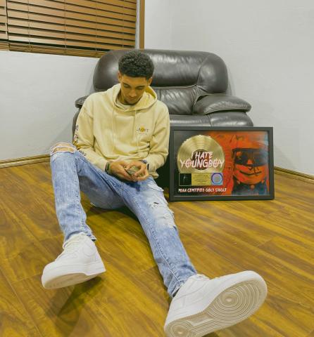 Kyler Mathis in what seems like a plain room, until you notice the gold record at his side. Mathis, 26, from Watonga, is making a name for himself in the music world