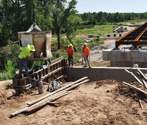 Employees of OBC continue their work on the Pony Bridge reconstruction over the Canadian River on historic Route 66 between Geary and Hinton.