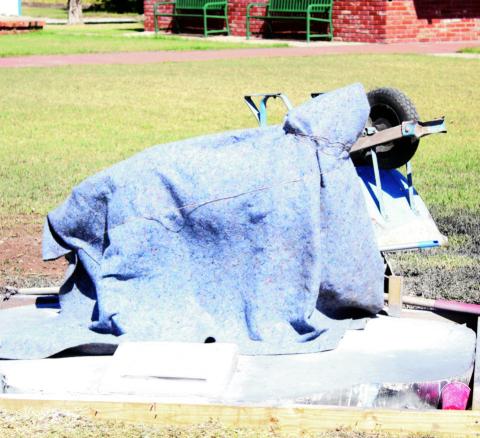 ABOVE: Wrapped bronze dedicated to Dr. Fred and Joyce Lucas, longtime Watonga residents and supporters.