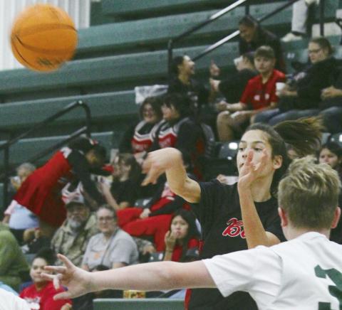 Basketball Falls to Thomas on the Road