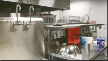 The brand spanking new kitchen may be Sheriff Travis Daugherty’s favorite part of the new jail PHOTO BY CONNIE BURCHAM