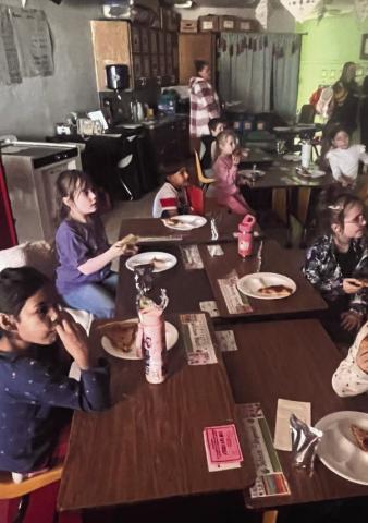 (TOP LEFT) First grade earned the class brags pizza party by collecting the most classroom brags during the first semester. Keep showing responsibility, kindness and teamwork and celebrating success! (TOP RIGHT) Another assistant principal, Tyler