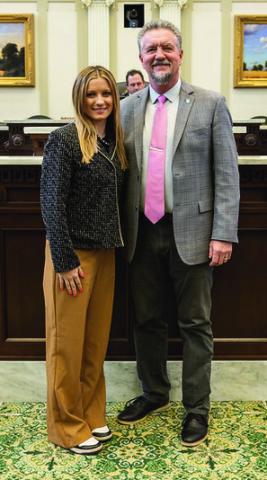 Avery Fisher, (L), with Rep. Mike Dobrinski, both of Okeene. Fisher served as a page for Dobrinksi during the Legislative session.