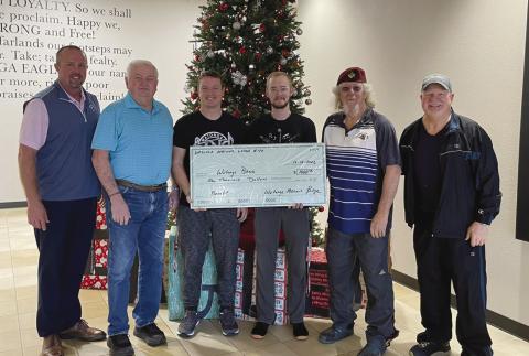 Members of the Watonga Masons recently presented a $1,000 check to WHS principal Todd Overstreet (L) and band leaders Shane Johnson and Lincoln Spurlin (C). The money was raised at the Mason’s Pancake Breakfast and is to benefit the music program. The band leaders were in sweats because it was ‘Wear Your Pyjamas to School Day.’ Photos provided by Watonga Public Schools