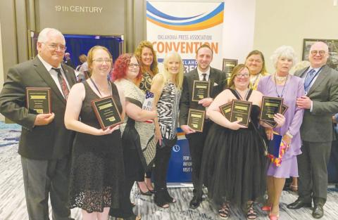 Wesner Publications employees pose with their awards following the Oklahoma Press Association convention on Saturday, June 12. Pictured above are (left to right) Brian and Kindra Blansett, Shirley Todd, Kimberly Jenkins, Angie Gentry, Graham Dudley, Tatiana Ryland, Shalene White, Zonelle Rainbolt and Brett Wesner.