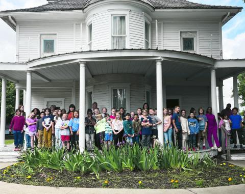 (ABOVE) The entire third grade from Watonga Elementary School came to the T.B. Ferguson Home Museum Friday for a tou. They learned about one-way windows, being shot at, and how a butter churn worked, among other things.