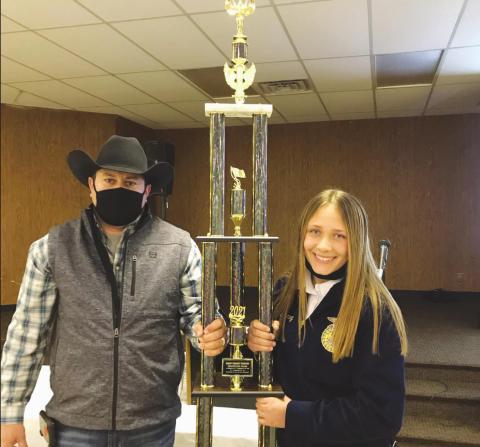 Garen Robison, Blaine Co Fairboard member presenting the Hoberecht Award to Kelsi Scheihing, Watonga.