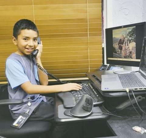 ABOVE AT RIGHT Ezra Ramirez won the chance to be principal for a day at Geary Elementary School