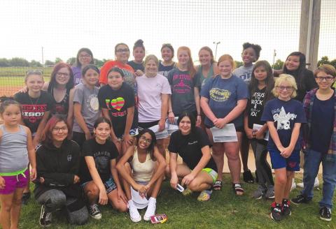 (Above) Players from both the high school and junior high Geary Lady Bison softball squads pose for a picture at the Geary Softball Field on Thursday, June 4 following the first player and parent softball meeting under first-year Lady Bison softball head coach Rick Scott. Photo Courtesy of Geary Public Schools The Geary Star