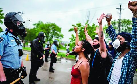 Peaceful protests such as this in one Minneapolis in 2020 try to bring the issue of how people of color are treated by law enforcement into focus.