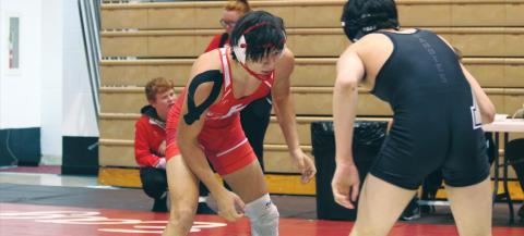 (Above) Hinton High School varsity wrestling senior Trenton Lusk looks to make his next move against an opponent on Dec. 6, 2019, at the Max Dippel Memorial wrestling tournament held at Weatherford High School. On March 30, it was announced that Lusk had made the 3A West 2020 All-Star Wrestling Team in the 152-pound weight class. ANDREW SALMI/HINTON RECORD