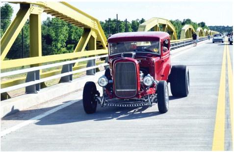 Old and new cars and motorcycles drove on the William Murray (Pony) Bridge after the ribbon cutting on May 10. The bridge had been closed for rehabilitation since November 2022. Photo by Richard Stephens