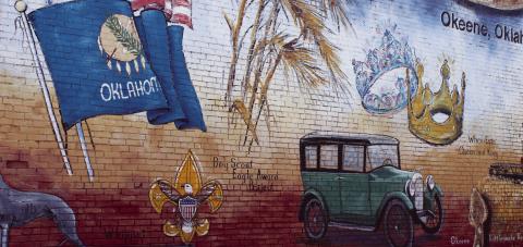In keeping with its reputation for brilliantly painted murals and buildings, Okeene is in the running for an award from Paint Oklahoma Beautiful, an arm of Keep Oklahoma Beautiful. The project up for the accolades is the new paint job on the former blacksmith shop across the street from the Okeene Hospital. Hopes are the building will continue to be dressed up with period symbols of the smithing trade.