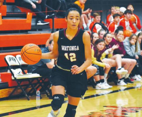 Kiyla Cooper dribbles up the court for Watonga. Brenda Geels Watonga Republican