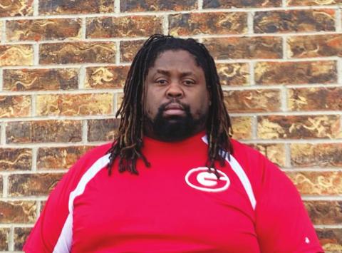 Cedric Powell stands outside the Stegall Long Fieldhouse before wrestling practice on Sunday, Nov. 21.