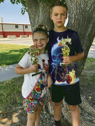 ABOVE: Celebrating a couple kiddos going to The National Pedal Pull in Mitchell, South Dakota at the end of the month. Saturday, September 7, at the State Pedal Pull in Norman, 5-year-old Randi Garrett won third place and 8-year-old Dillinger Garrett won second place.
