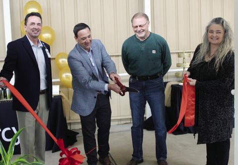 Mercy Administrator Bobby Stitt (L), Facilities Director Kenny Thompson, Watonga Mayor Bill Seitter and City Manager Karrie Little cut the ribbon Thursday on the new CT scanner at Mercy Watonga