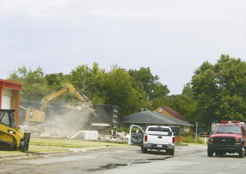 Demo crews are at work on the site of the former Watonga Middle School. The crews are taking down the old administration building, the old band room and the cafeteria. The remainder of the campus will remain standing and much of it repurposed for school use.