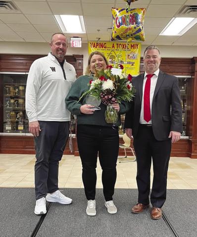 Carrie Compton was named Watonga Public Schools Teacher of the Year for 2022. Compton is shown with high school principal Todd Overstreet and Superintendent Kyle Hilterbran.