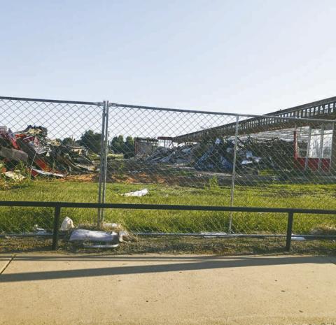 (ABOVE) The remainder Monday of the old Geary High School. The district is working with the insurance company and the architects to determine what they can build with the money they have.
