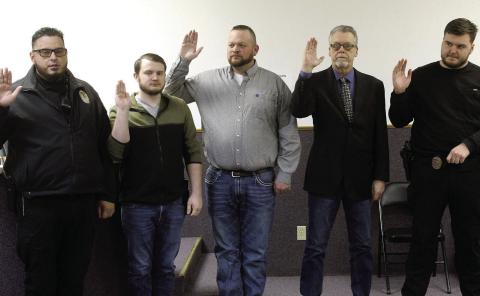 The City of Geary swore in five new police officers March 1. Shown are (L-R) Jonathon DeJesus, school resource officer, Dalton Errigo, reserve patrol officer, Adam Hopper, patrol officer, John Smith, patrol officer and Levi Johnston, patrol officer. The additions bring the department up to a fully staffed level for the first time in recent memory.