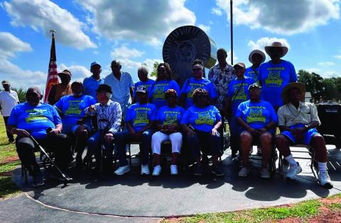 Dunbar Alumni reunite in front of the Dunbar Memorial on Saturday, June 20, 2026. at Legion Park.